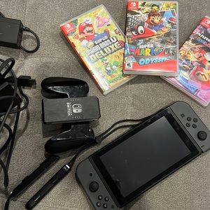 Nintendo Switch + Mario Games